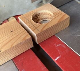 She cut holes in wooden squares for this designer tablescape idea