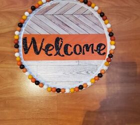 thanksgiving fall dollar tree pizza pan wreath, Glue wood beads on outer border of pizza pan