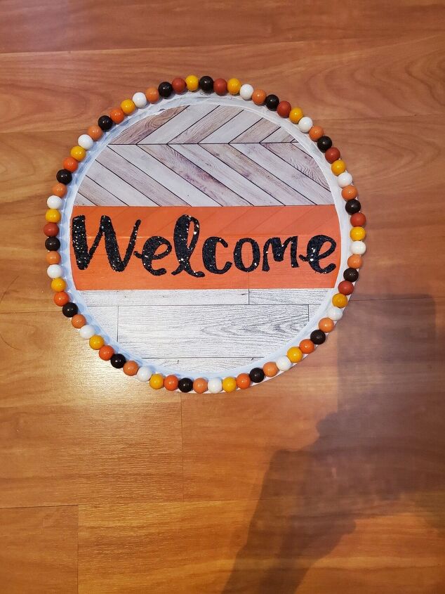 thanksgiving fall dollar tree pizza pan wreath, Glue wood beads on outer border of pizza pan