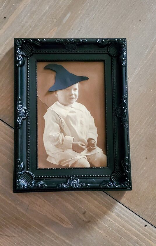 how to turn vintage portraits into fun halloween witch decor