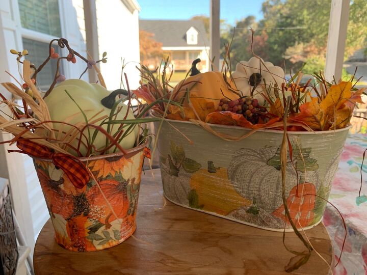 Buckets filled with mini pumpkins