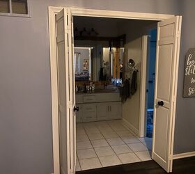 They ripped out their bi-fold bathroom doors and replaced them with something so much cooler