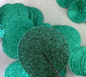 She cut little green foam circles for adorable Christmas decorations