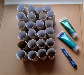 She uses a bunch of empty toilet paper rolls for this idea that combines 2 of our favorite Christmas DIYs ever