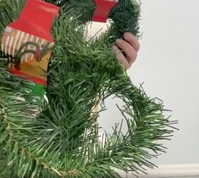 7 simple steps to make this festive diy christmas topiary, Faux greenery garland