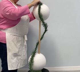 7 simple steps to make this festive diy christmas topiary, DIY Christmas ball topiary