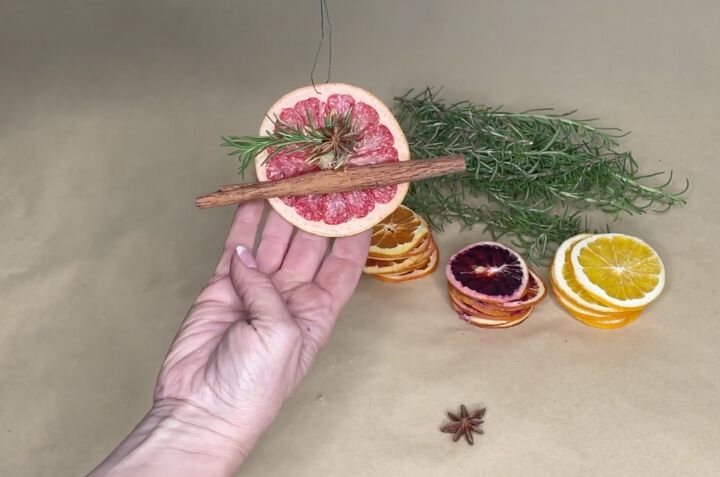 3 easy citrus dcor ideas to upgrade your home for the holidays, Dried citrus slice ornament with rosemary and cinnamon