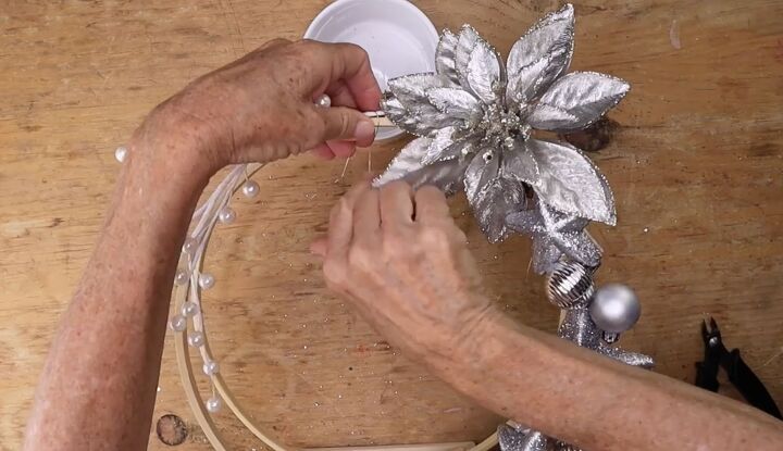 5 simple steps to make a stunning embroidery hoop centerpiece, Adding a pearl branch to the holiday d cor piece