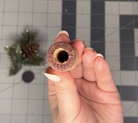 If you have some extra wine corks lying around, drill a hole through them for something SO festive for your fridge