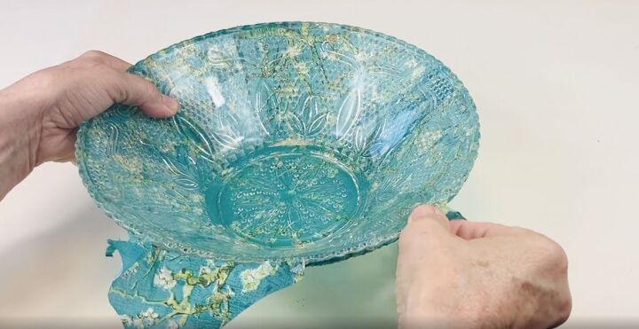 here s how to reverse decoupage glass bowls into decorative showpieces, Removing excess bits of the decoupage napkin