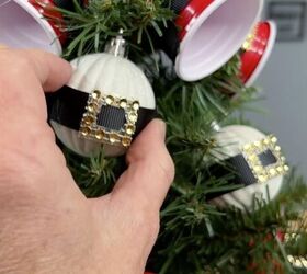 add a jolly touch to your holiday dcor with santa string lights, Santa belt buckle ornament
