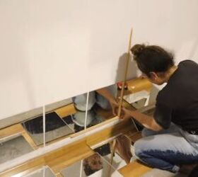 this easy mirror wall diy hack uses cheap mirrors from ikea, Sticking the IKEA mirrors on the wall