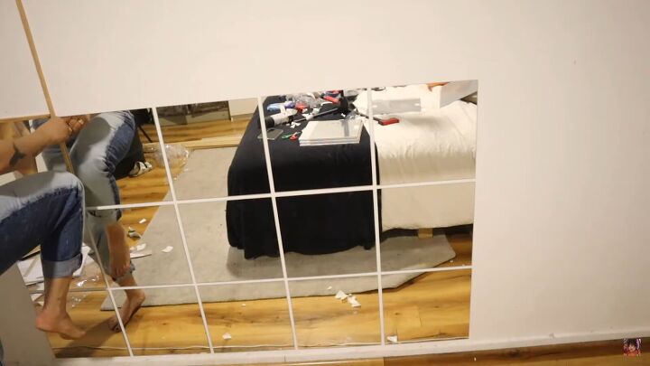 this easy mirror wall diy hack uses cheap mirrors from ikea, Industrial mirror wall made using IKEA mirrors