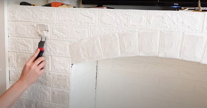 how to make an easy diy foam fireplace without using power tools, Toning down the texture with joint compound