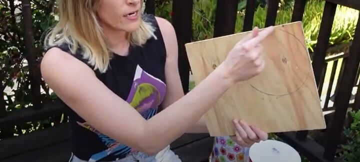 how to make a chic diy round end table out of cheap trash cans, Drawing a circle on wood