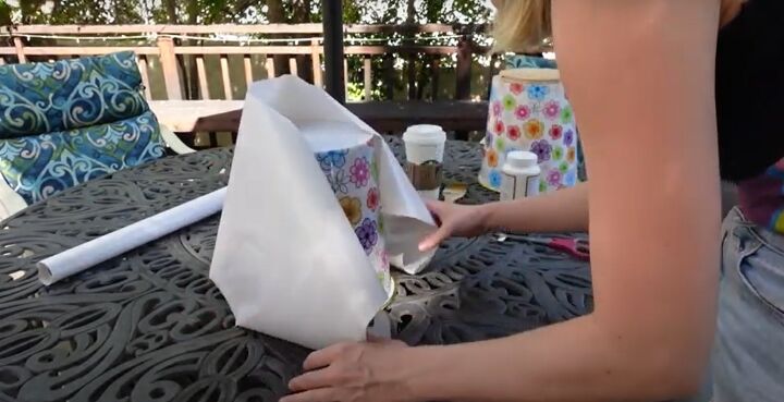 how to make a chic diy round end table out of cheap trash cans, Cutting the template to cover the trash cans
