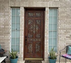 puerta de entrada convertida en rustica con elegancia