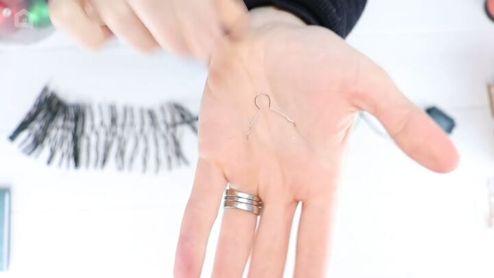 christmas decor how to make a beautiful diy ornament garland, The hook removed from a Christmas bauble