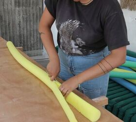 how to make an awesome pool noodle bed frame in 6 simple steps, Cutting the pool noodles in half