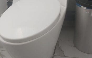 How do I fix a toilet tank that doesn't fill up?