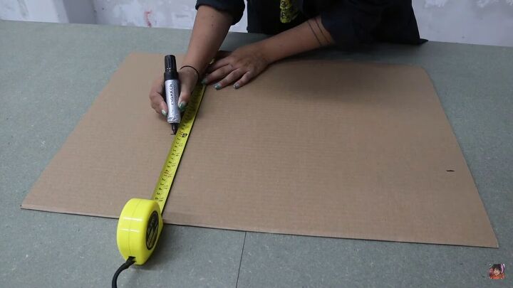 how to make a cardboard chair that holds weight looks chic, Measuring with a tape measure