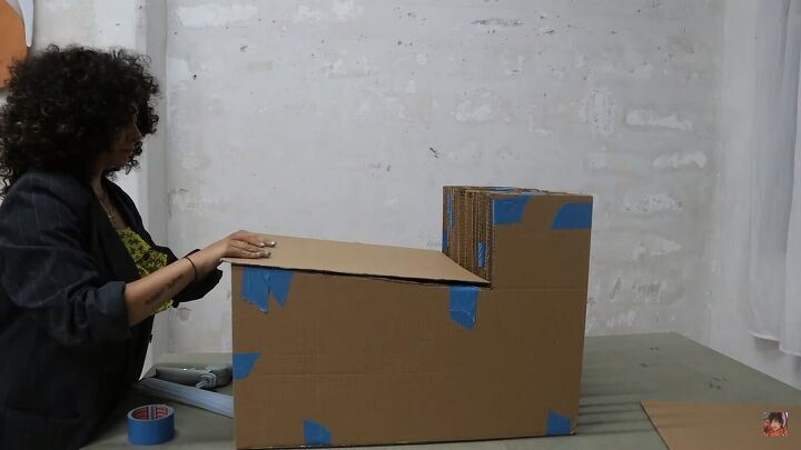 how to make a cardboard chair that holds weight looks chic, Sticking the seat down