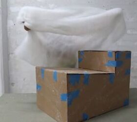 how to make a cardboard chair that holds weight looks chic, Draping foam over the chair