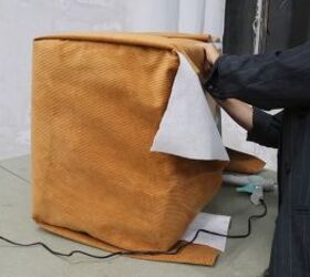 how to make a cardboard chair that holds weight looks chic, Gluing the bottom of the fabric to the base