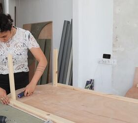 how to make a funky diy couch out of pool noodles, Drilling the beams in place