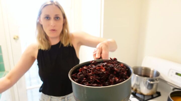 how to naturally color fabric with beet hibiscus turmeric dyes, Removing the hibiscus flowers