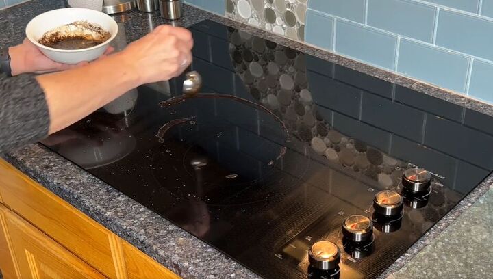 7 astonishing coffee grounds hacks to save you time and money, Clean your stovetop with coffee grounds