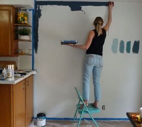 how to create an impressive dining room accent wall for only 70, Painting the blue accent wall