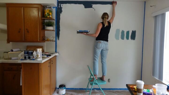 how to create an impressive dining room accent wall for only 70, Painting the blue accent wall