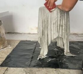 how to make a concrete side table with a cool optical illusion, Sanding the DIY concrete side table