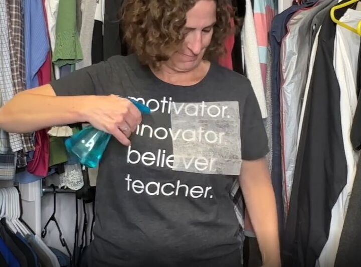 6 dryer sheet hacks the secret to effortless cleaning, Spraying antistatic mixture onto clothes