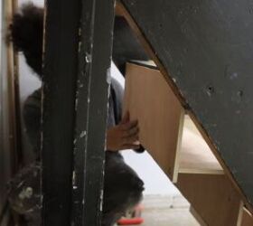 how to a cute bookcase stairs makeover for just 50, Nailing the plywood pieces in place