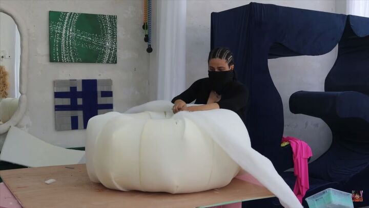 diy boa pouf dupe how to make a cute donut chair, Gluing the layer of batting to the donut chair