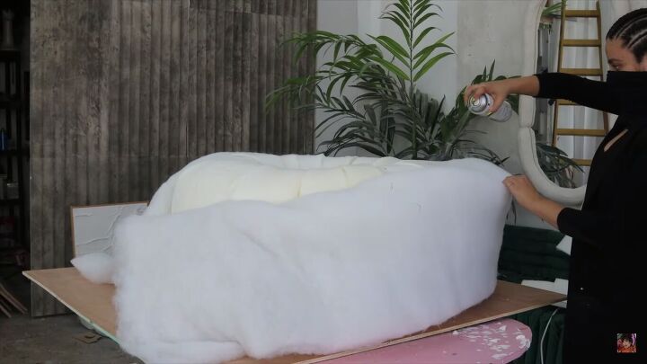 diy boa pouf dupe how to make a cute donut chair, Flipping and spraying the donut chair