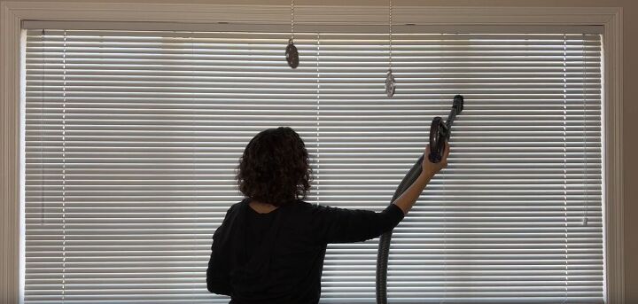 diy dust removal guide how to effortlessly banish dust, Removing dust on blinds with the brush attachment on a vacuum cleaner