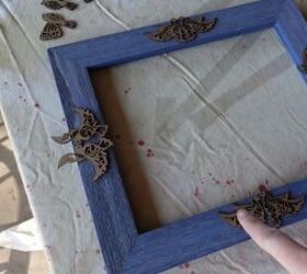 want a glam gold frame gallery wall here s how to diy it, Gluing wood cut birds to the frames