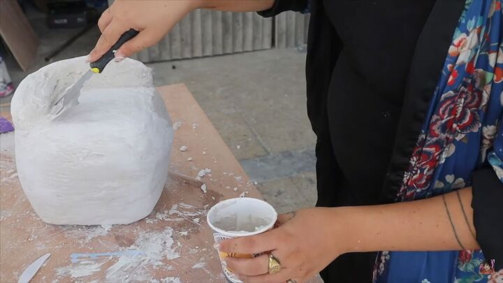 how to make a diy modern coffee table inspired by studio mignone, Going over the block with a flat tool