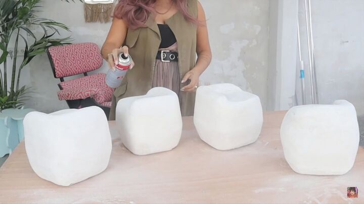 how to make a diy modern coffee table inspired by studio mignone, Spraying the cubes with white gloss paint