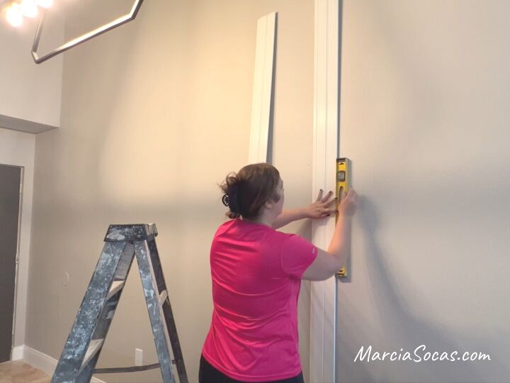 how to create a separate dining area with a beadboard accent wall, Marking the start of the beadboard accent wall