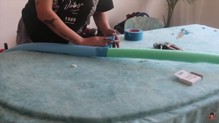 how to make a diy pool noodle headboard in a few easy steps, Taping two pool noodles together