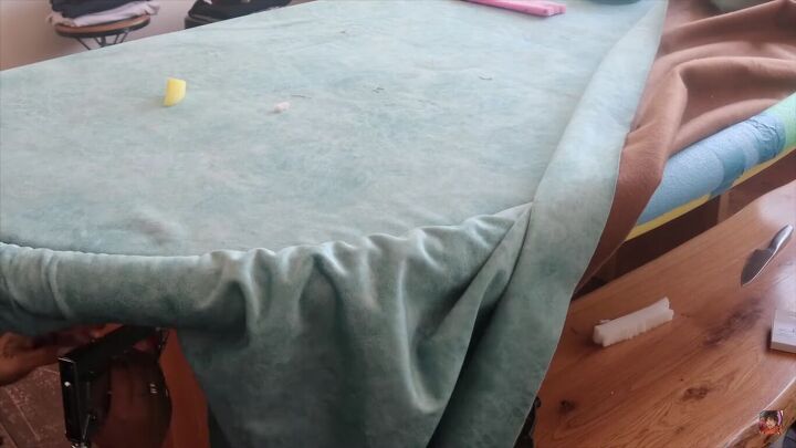 how to make a diy pool noodle headboard in a few easy steps, Covering the pool noodle with fabric