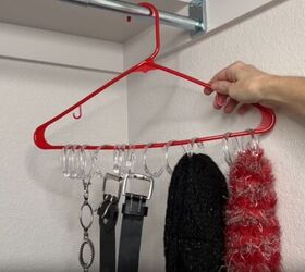 12 amazing hanger hacks to keep your home organized, Scarves and belts hanging from shower curtain rings attached to a hanger