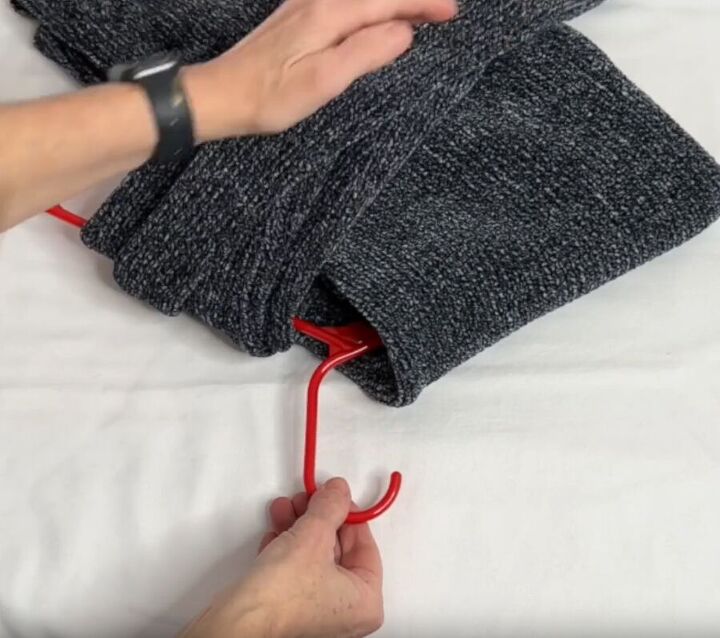 12 amazing hanger hacks to keep your home organized, Looping sleeves over the hanger