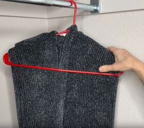 12 amazing hanger hacks to keep your home organized, Sweater hanging in a closet
