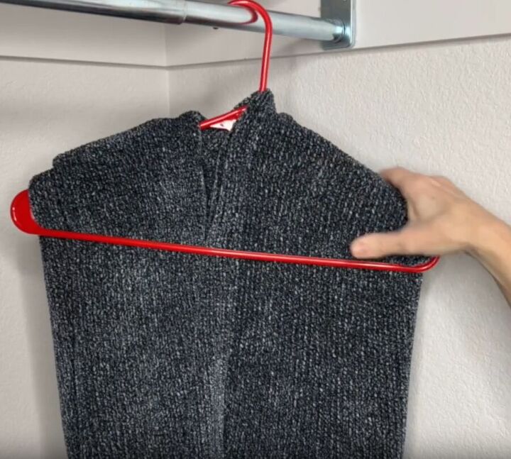 12 amazing hanger hacks to keep your home organized, Sweater hanging in a closet