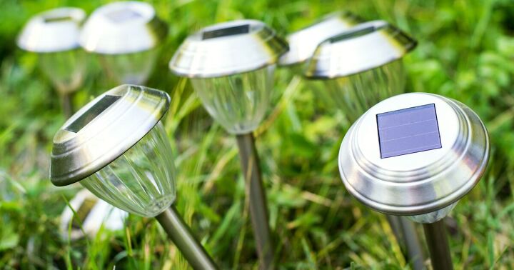 The Best Way to Restore Outdoor Solar Pathway Lights 2 the best way to restore outdoor solar pathway lights, A bundle of silver solar pathway lights in green grass